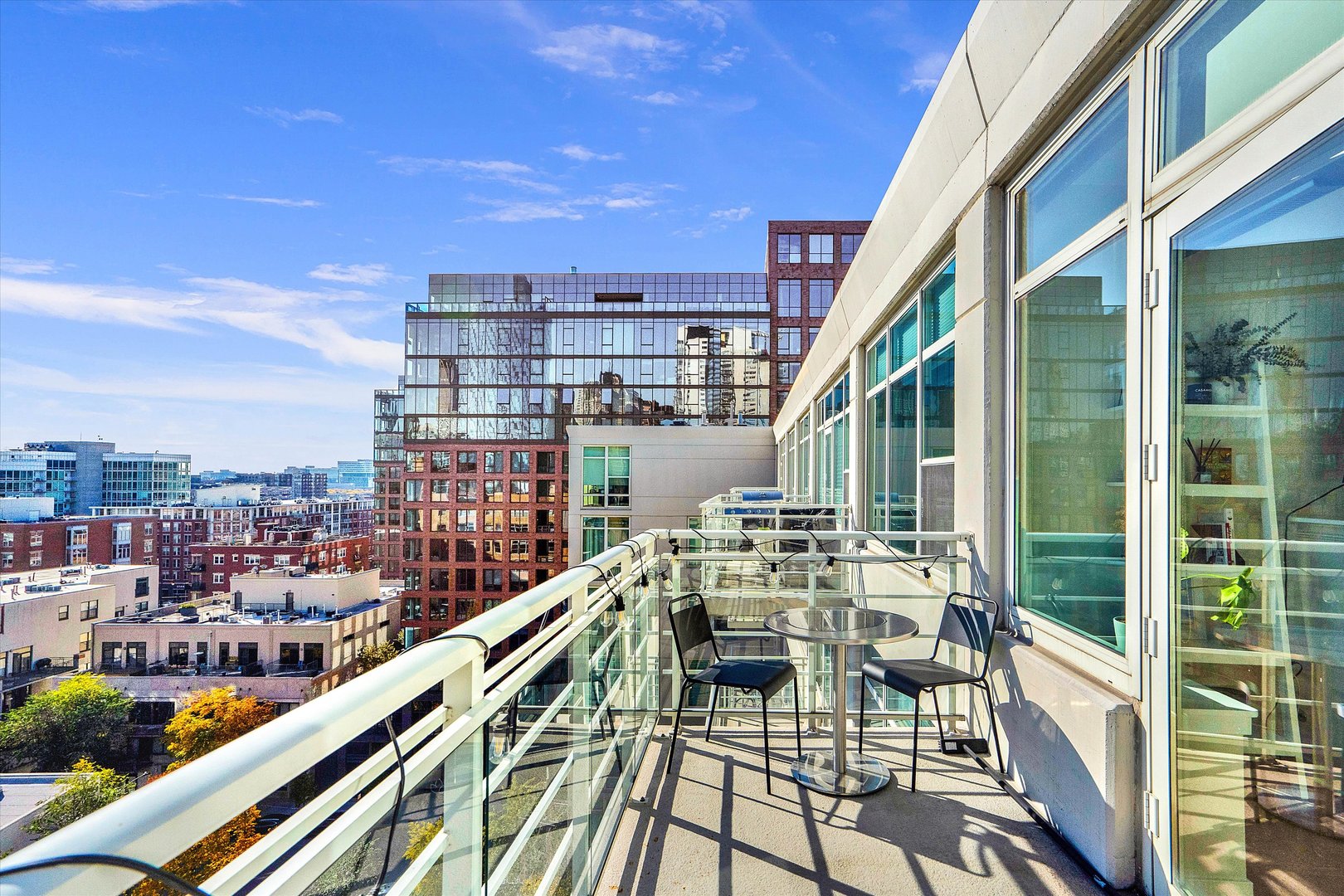 909 West Washington Boulevard, Unit 1002 Chicago, IL 60607 - Photo 10 of 15 a view of balcony with furniture