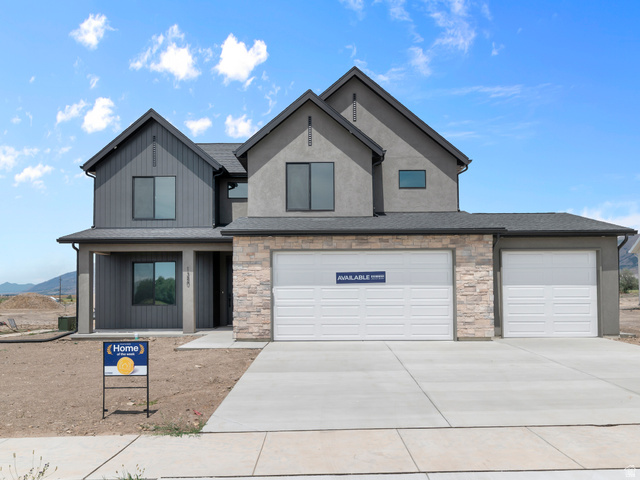 1380 West 2350 South, Unit 16 Perry, UT 84302 - Photo 2 of 34 Contemporary exterior featuring a combination of horizontal siding, stucco, and stone veneer