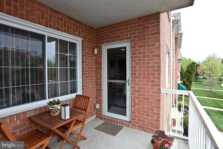 404 Kilree Road, Unit 201 Lutherville-Timonium, MD 21093 - Photo 14 of 16 Large porch.