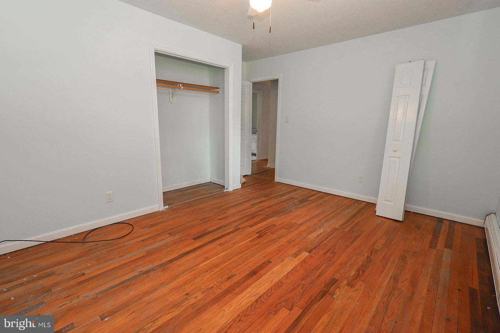 48146 Mallard View Lane St. Inigoes, MD 20684 - Photo 25 of 46 Spacious room with warm wood floors.