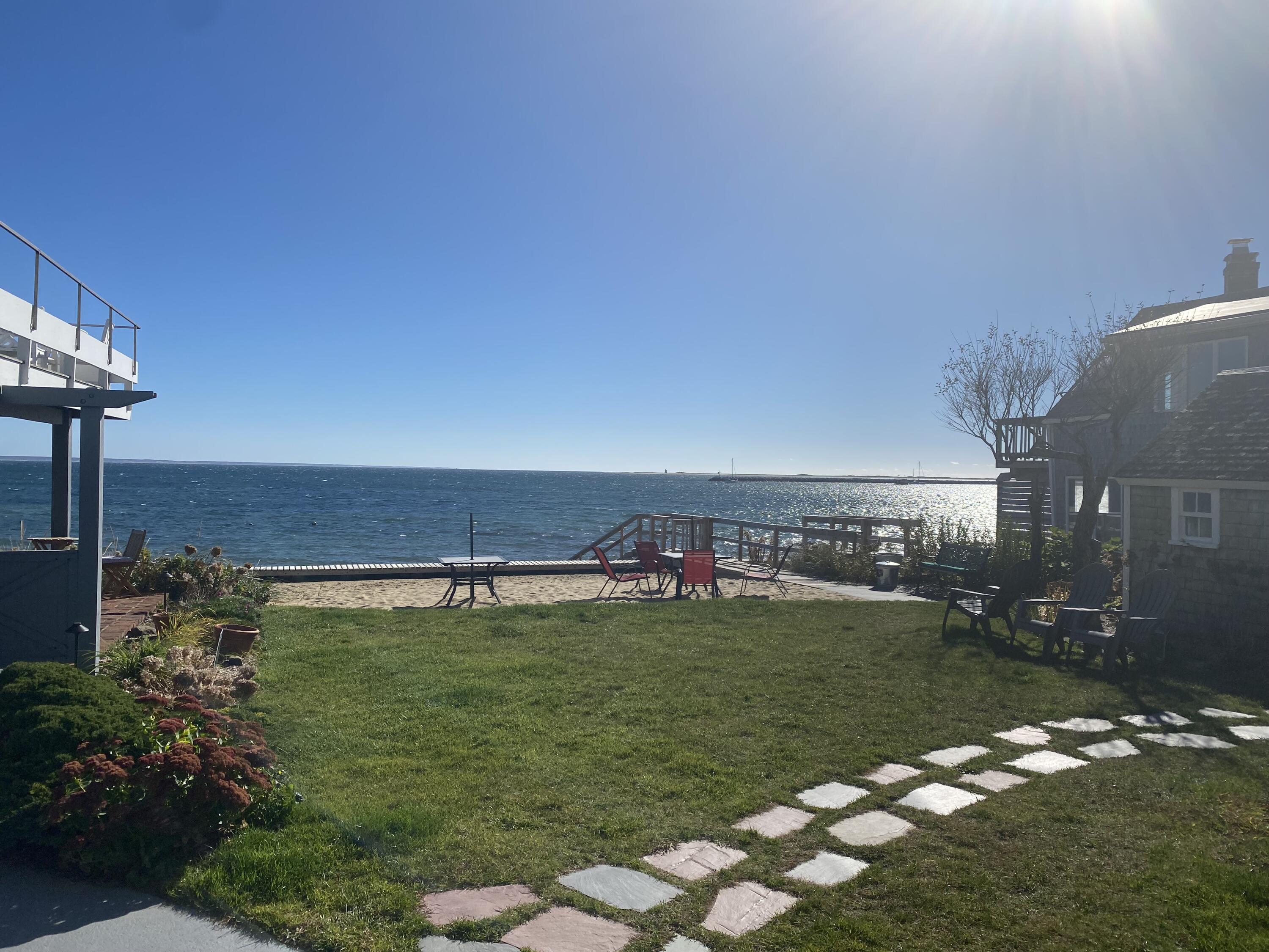 495 Commercial Street, Unit U11 Provincetown, MA 02657 - Photo 6 of 29 a view of a golf course with a lake