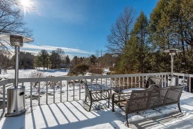 a view of a chairs on the roof deck