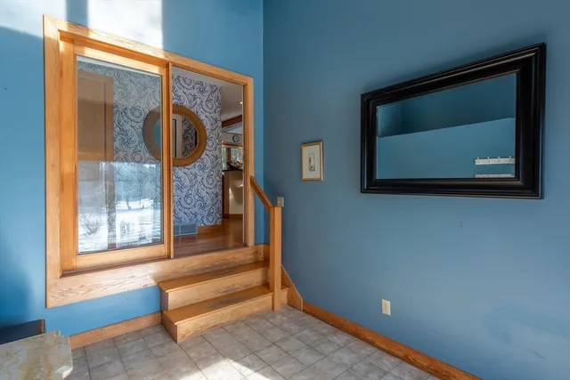 a view of entryway with a front door