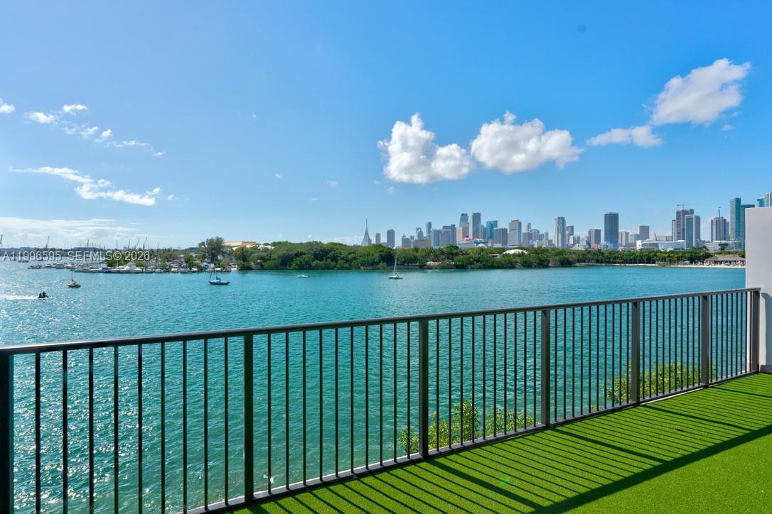 1000 Venetian Way, Unit 105 Miami, FL 33139 - Photo 36 of 49 a view of a city and a lake view