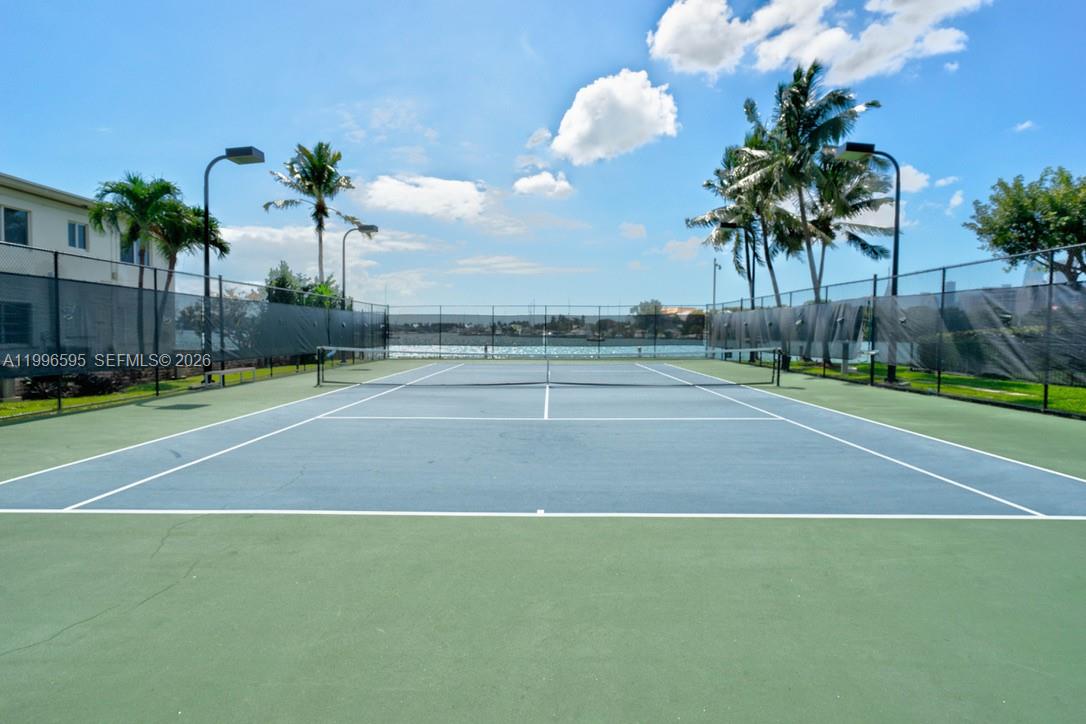 1000 Venetian Way, Unit 105 Miami, FL 33139 - Photo 40 of 49 a view of a basket ball ground and palm trees