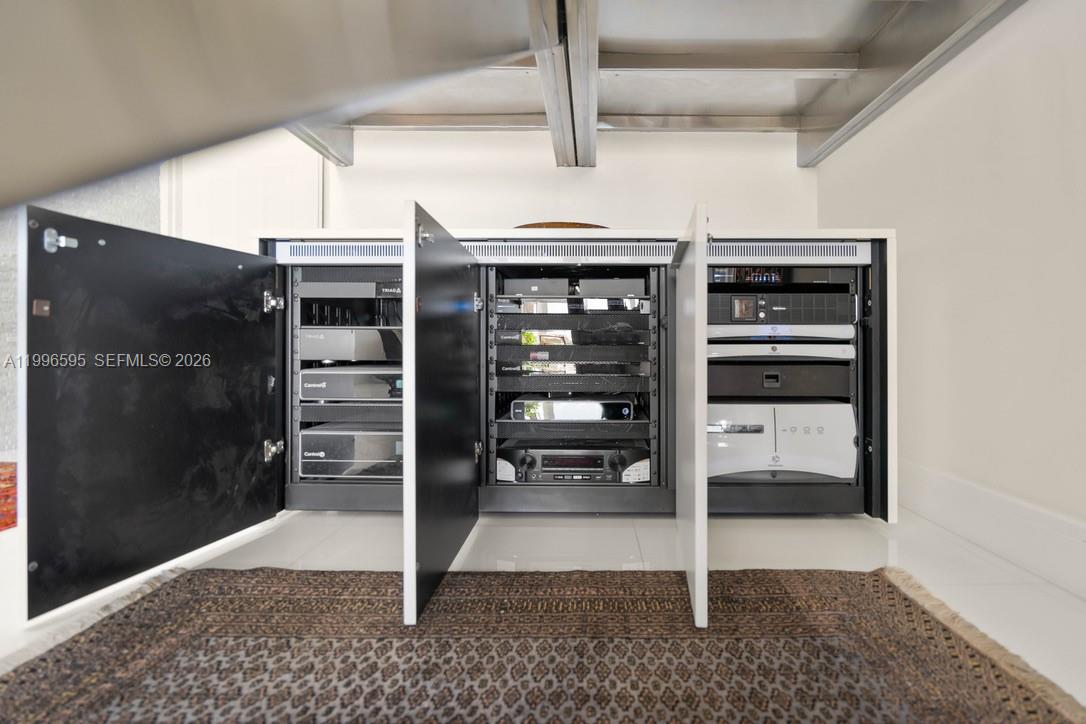 1000 Venetian Way, Unit 105 Miami, FL 33139 - Photo 41 of 49 a view of a room with racks