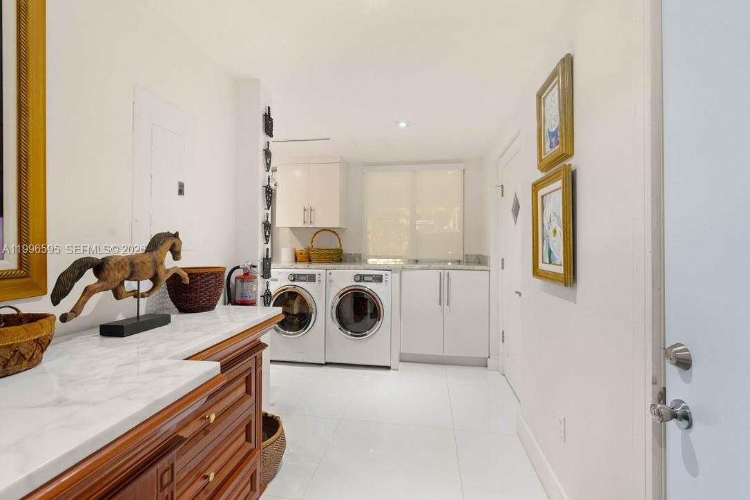 1000 Venetian Way, Unit 105 Miami, FL 33139 - Photo 42 of 49 a view of a kitchen with appliances and cabinets