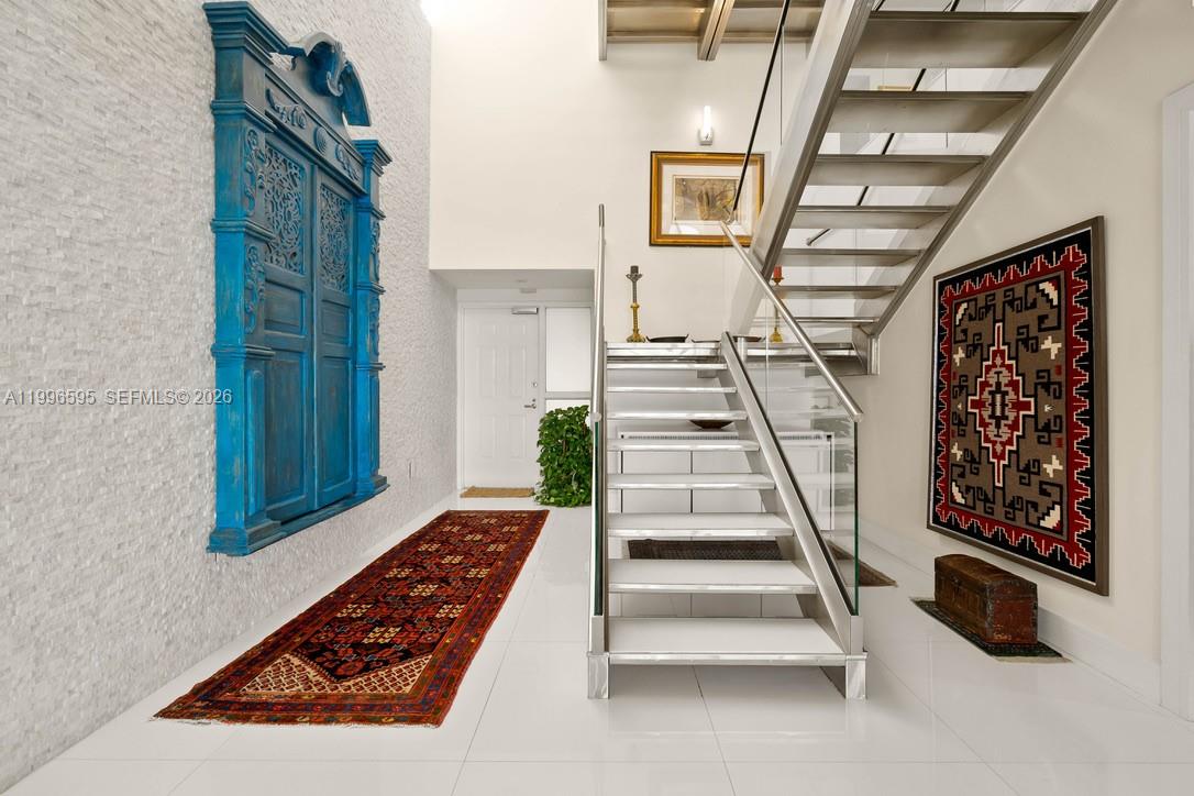 1000 Venetian Way, Unit 105 Miami, FL 33139 - Photo 6 of 49 a view of entryway with furniture and rug