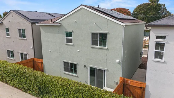 a house view with a backyard space