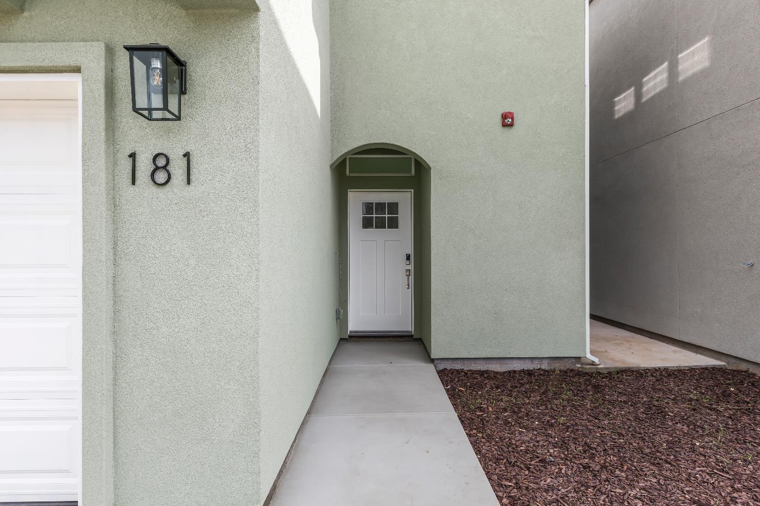181 Park Circle Gridley, CA 95948 - Photo 2 of 20 a view of a hallway with wooden floor