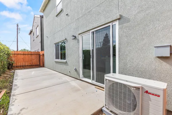 an aerial view of a residential building with lake view