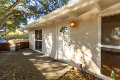 a view of a back yard of the house