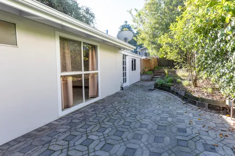a backyard of a house with lots of green space