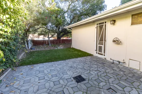 a backyard of a house with lots of green space