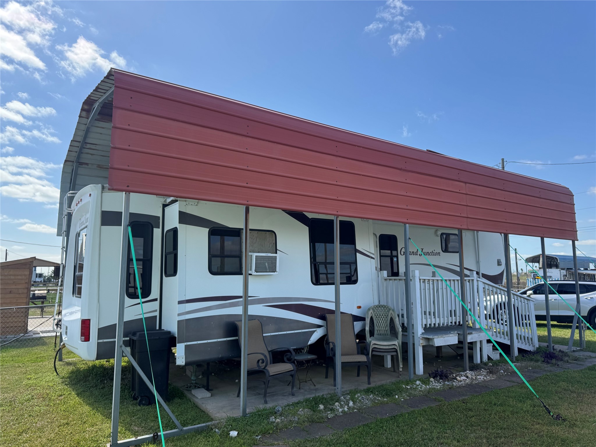 1561 County Road 299 Sargent, TX 77414 - Photo 1 of 26 a front view of a house with a garden
