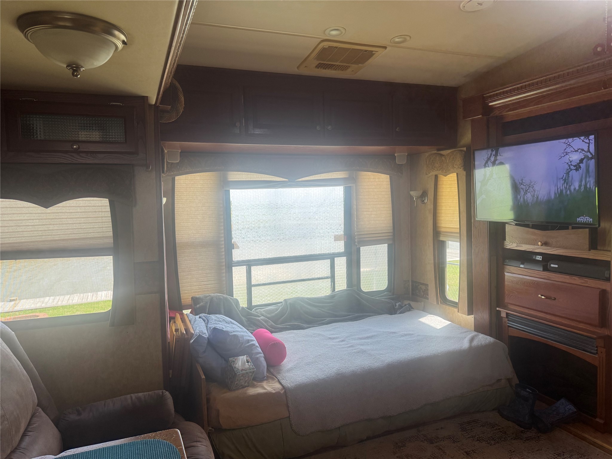 1561 County Road 299 Sargent, TX 77414 - Photo 13 of 26 a bedroom with a bed and large window