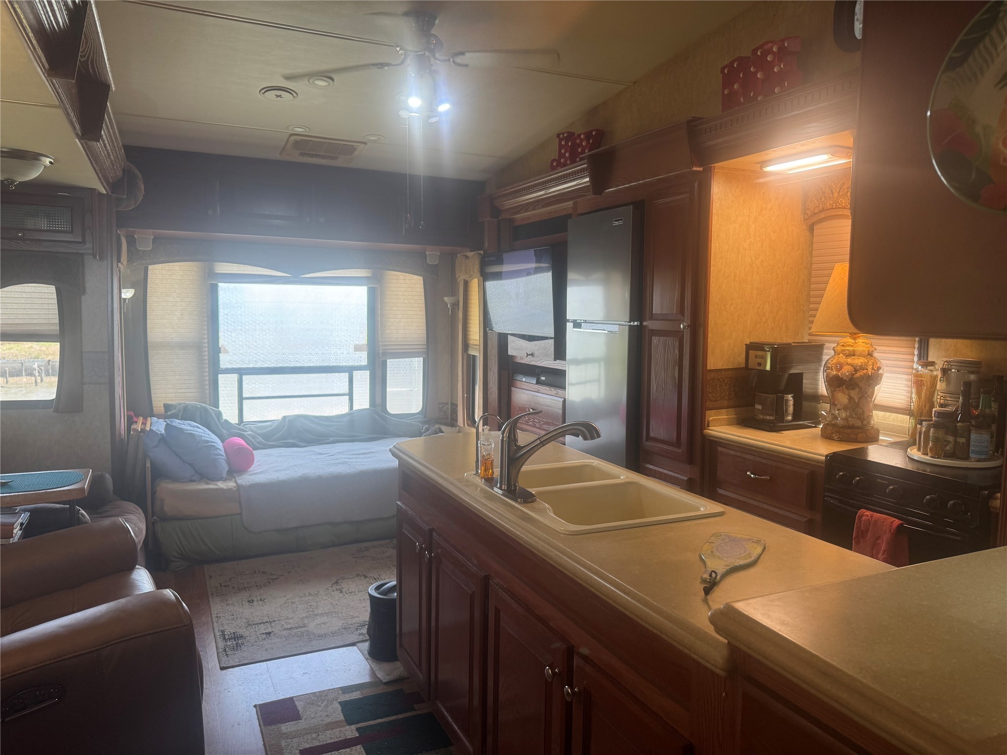 1561 County Road 299 Sargent, TX 77414 - Photo 16 of 26 a living room with furniture and a large window