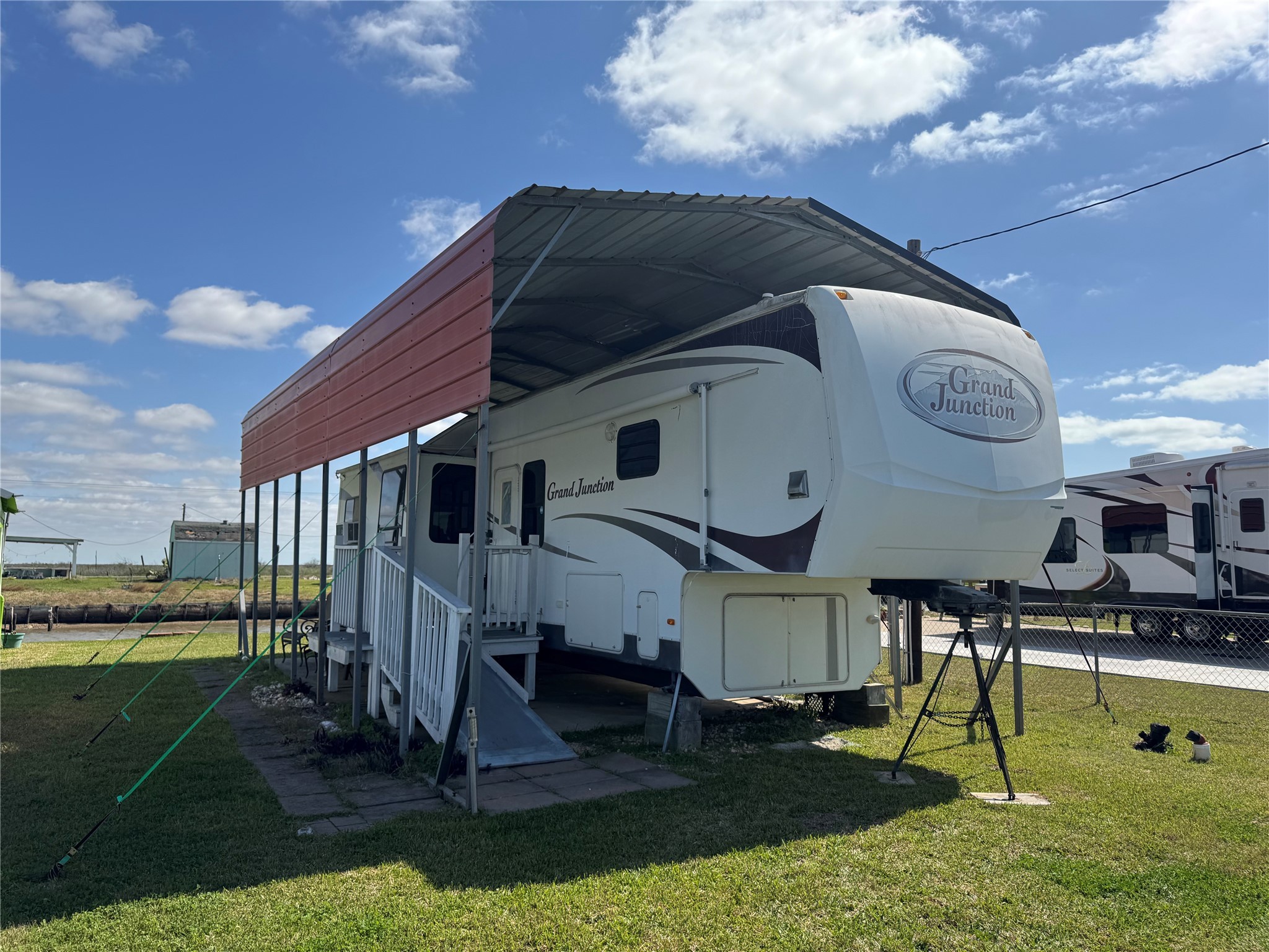 1561 County Road 299 Sargent, TX 77414 - Photo 2 of 26 a front view of a house with garden