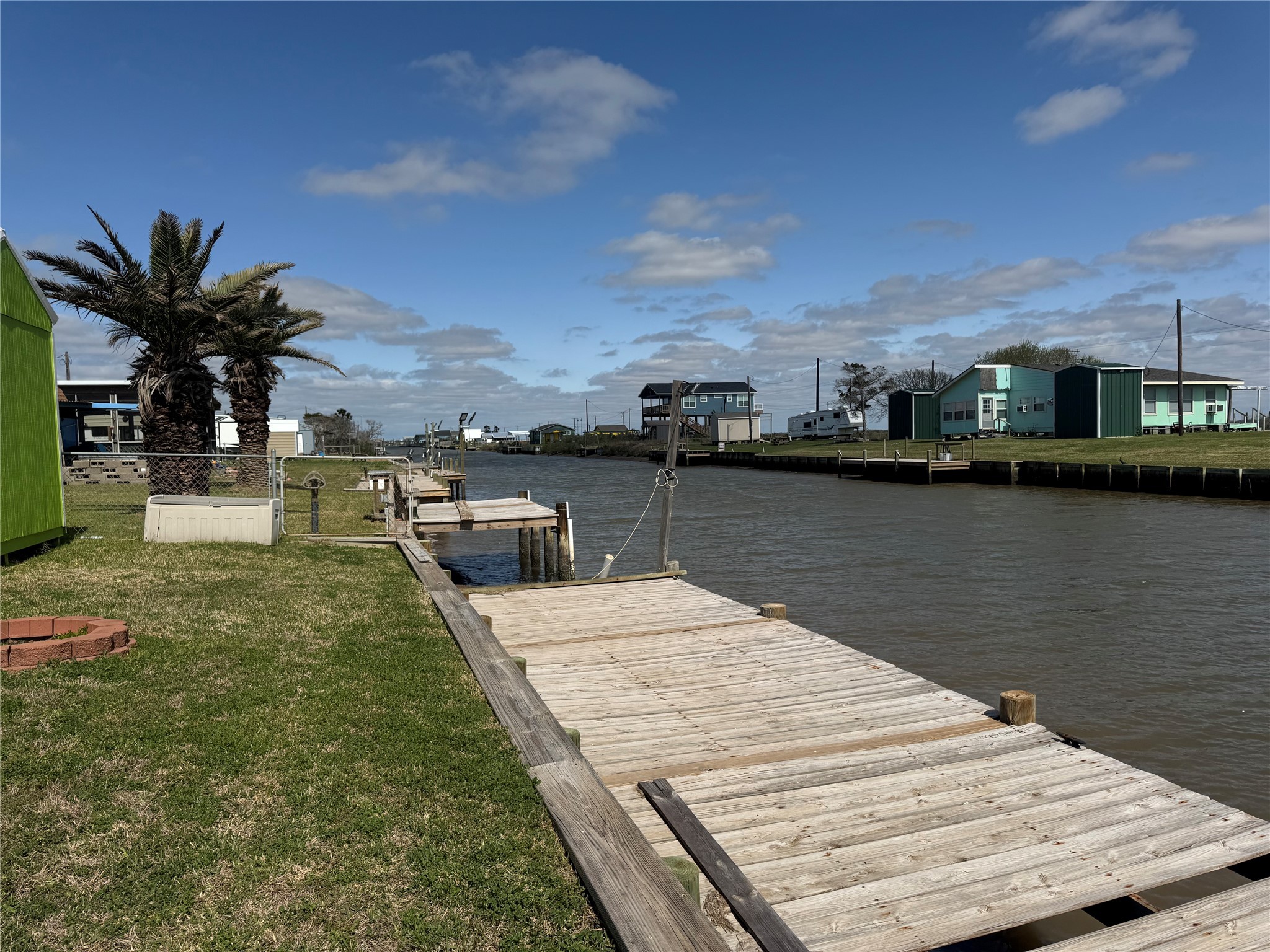 1561 County Road 299 Sargent, TX 77414 - Photo 5 of 26 a view of a lake with houses
