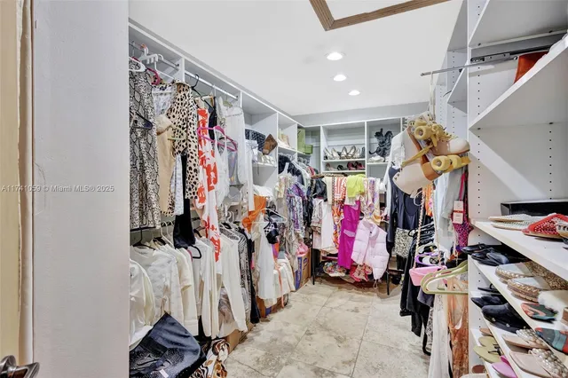 a view of a porch with a table and chairs