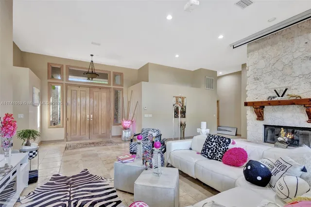 a living room with furniture and a table