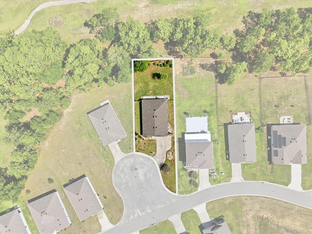 660 Hickory Course Loop Ocala, FL 34472 - Photo 4 of 45 an aerial view of a house with outdoor space