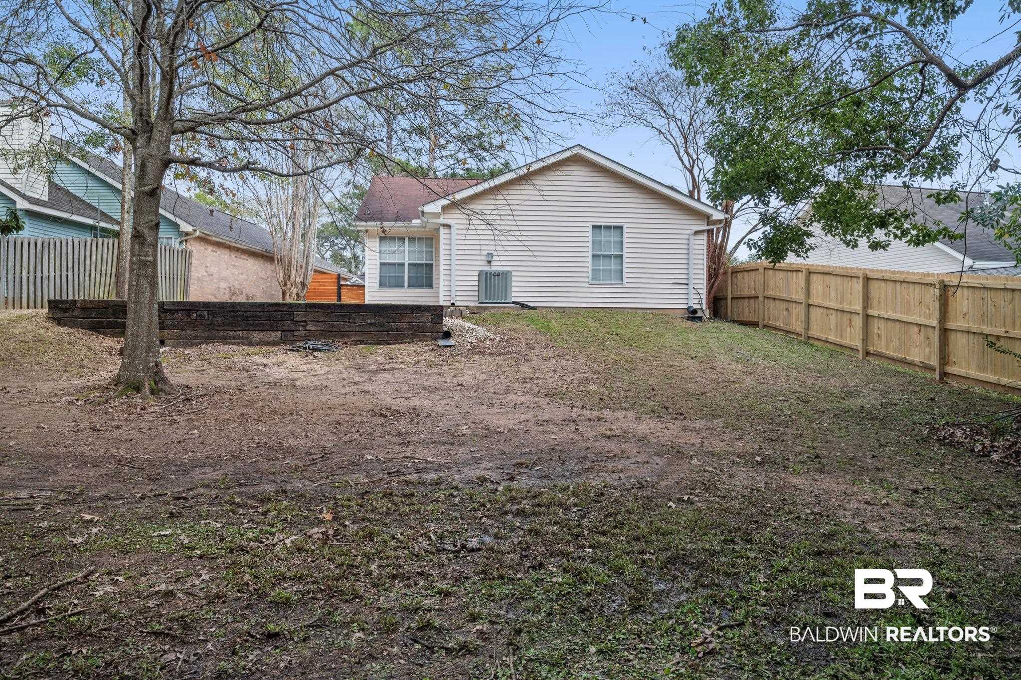 3716 Pepper Ridge Drive Mobile, AL 36693 - Photo 19 of 20 Rear view of house with cooling unit