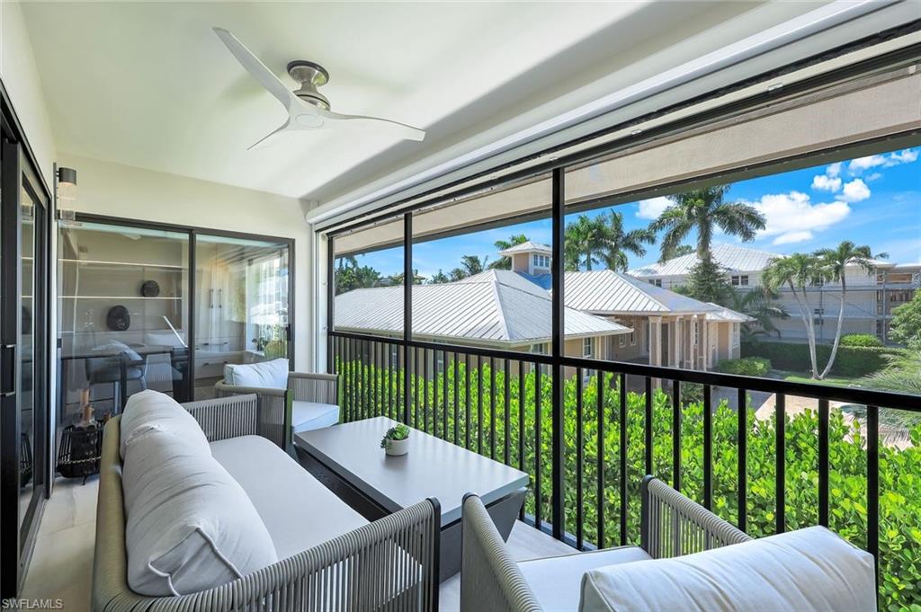 295 5th Avenue South Naples, FL 34102 - Photo 22 of 29 a view of a city from a balcony