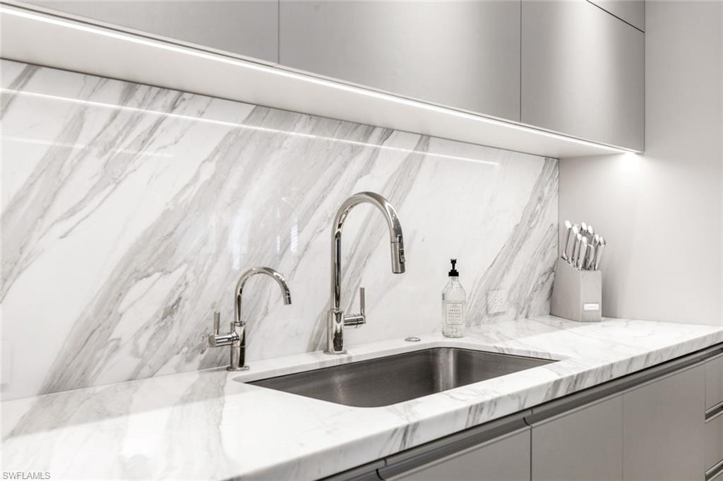 295 5th Avenue South Naples, FL 34102 - Photo 10 of 29 a close view of sink and tap