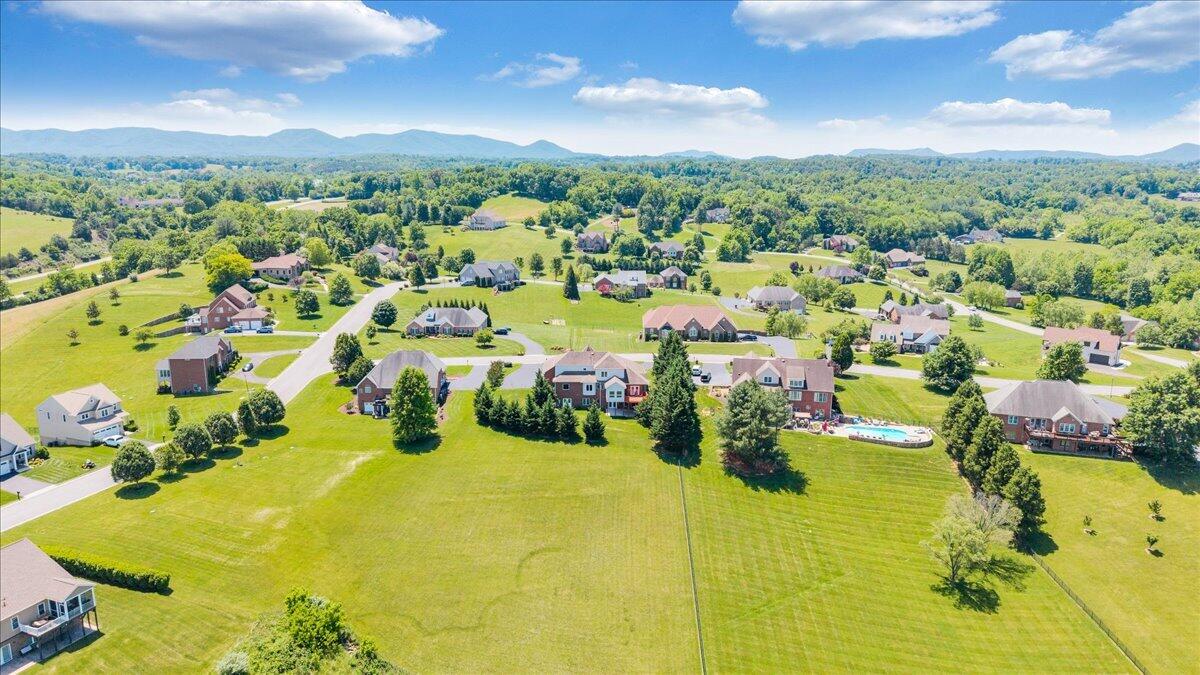 625 Frontier Way Fincastle, VA 24090 - Photo 88 of 105 a view of a swimming pool with a lot of trees in the background