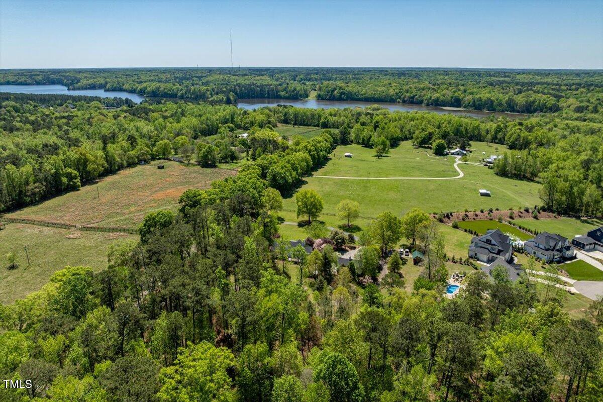 5212 Theys Road Raleigh, NC 27606 - Photo 44 of 56 an aerial view of a houses with a yard