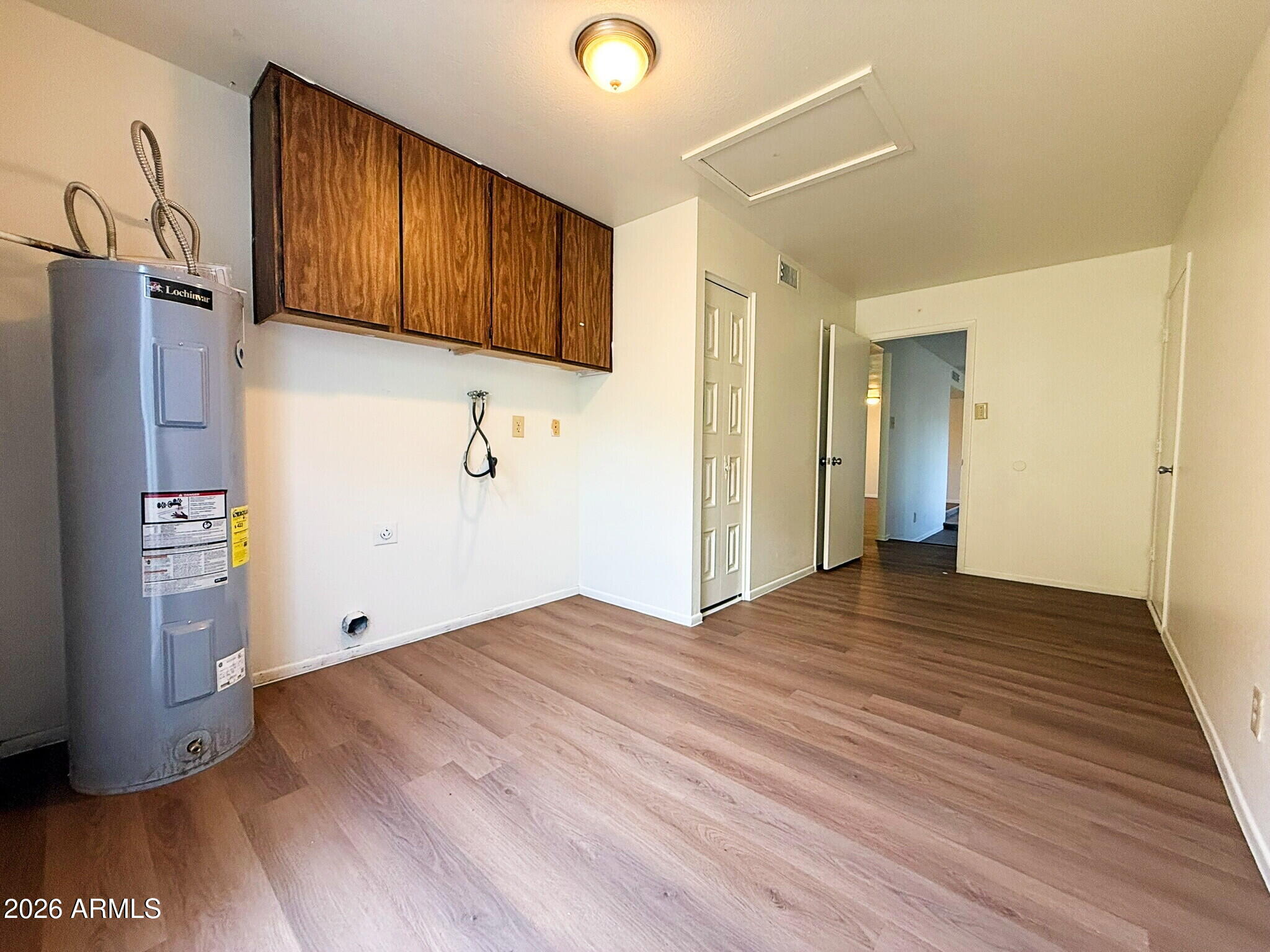 5208 West Calavar Road Glendale, AZ 85306 - Photo 39 of 39 a view of empty room with wooden floor