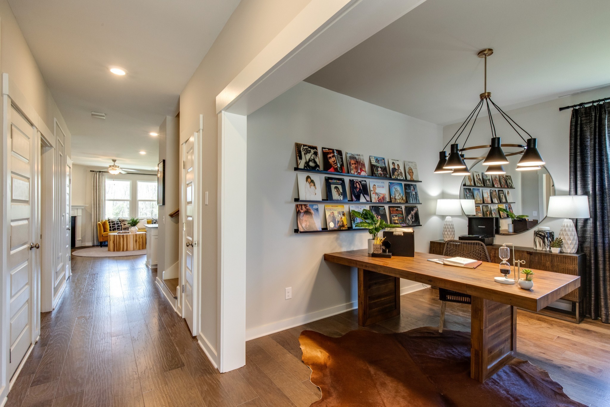 a room with furniture and a book shelf