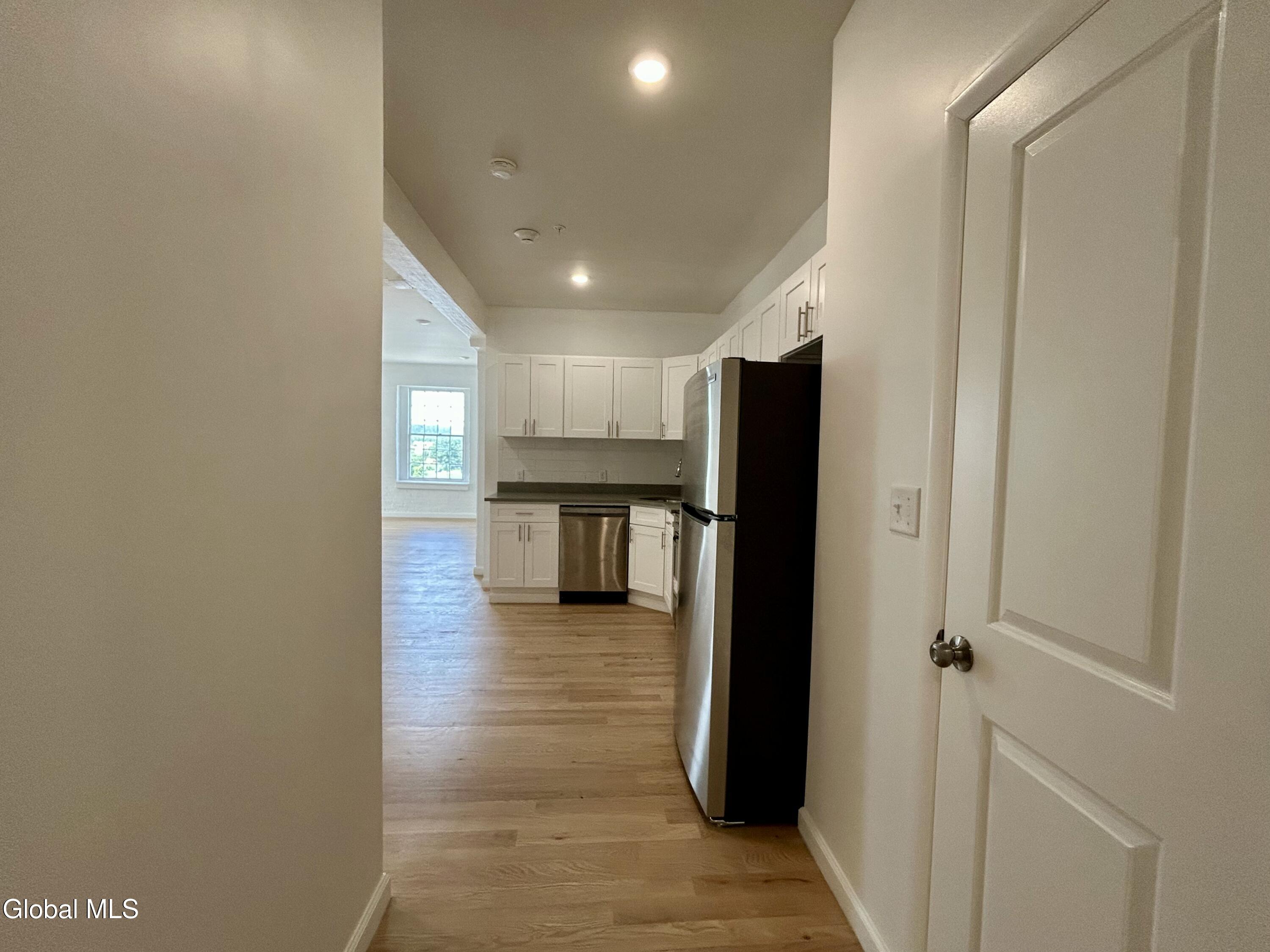 155 River Street, Unit 1B Troy, NY 12180 - Photo 6 of 16 1B Hallway towards Kitchen