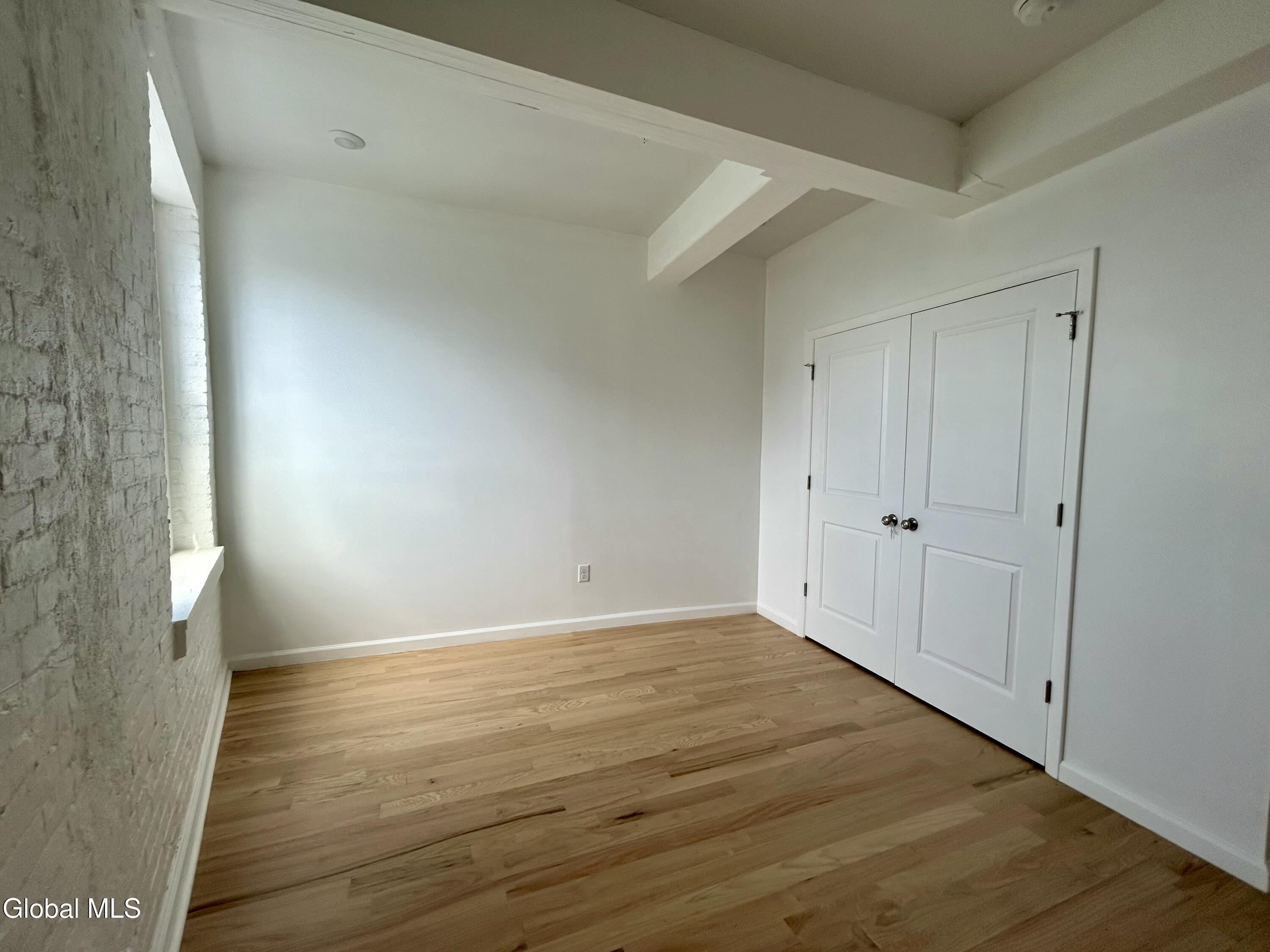 155 River Street, Unit 1B Troy, NY 12180 - Photo 10 of 16 1B Bedroom 2 (Left)