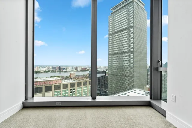 a view of a large window with a balcony