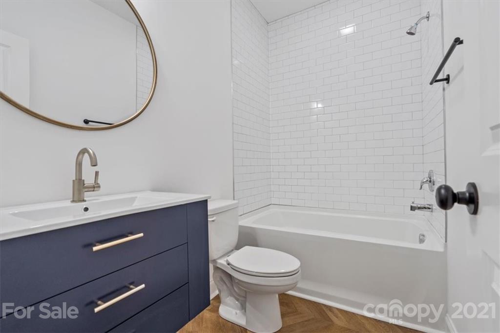 1902 Dunlap Roddey Road Rock Hill, SC 29730 - Photo 23 of 37 a bathroom with a sink a toilet and shower