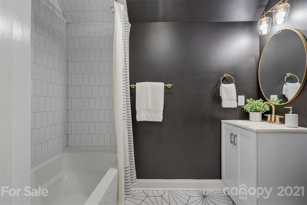1902 Dunlap Roddey Road Rock Hill, SC 29730 - Photo 32 of 37 a bathroom with a sink a toilet and shower