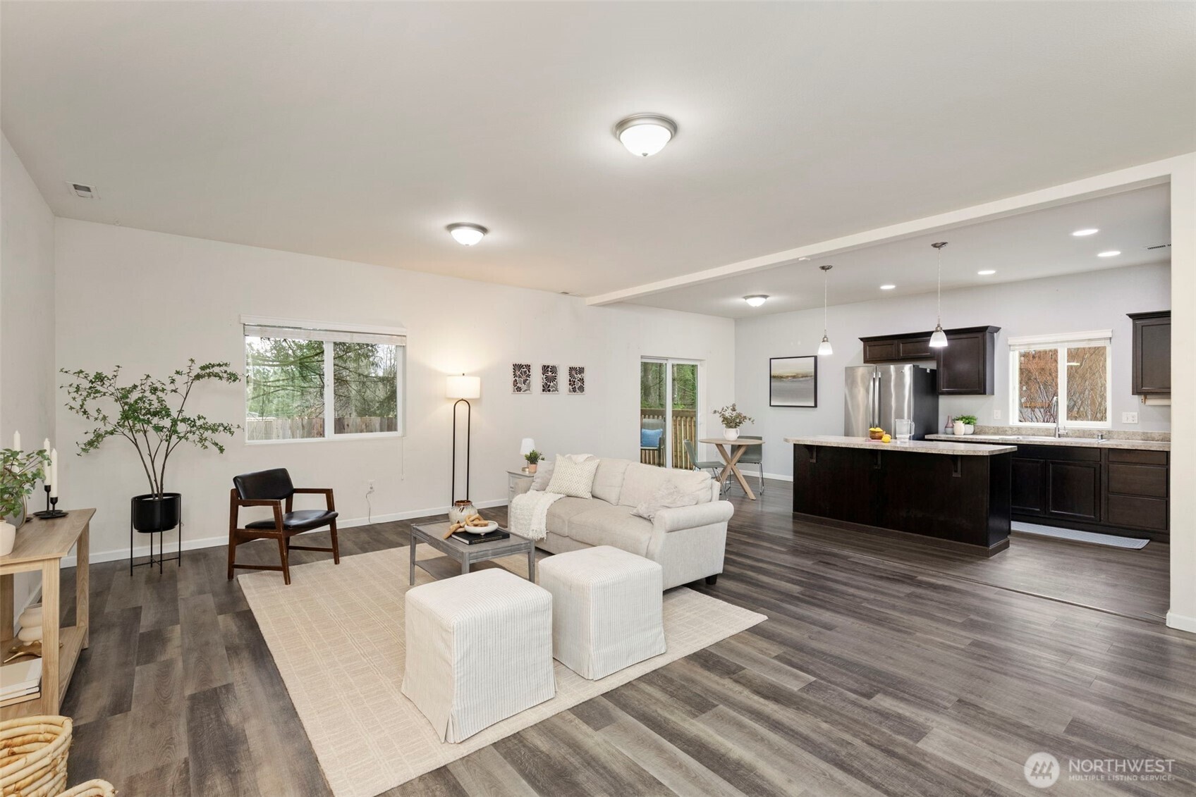 141 Southwest Marcia Way Port Orchard, WA 98366 - Photo 3 of 21 a living room with furniture and a wooden floor