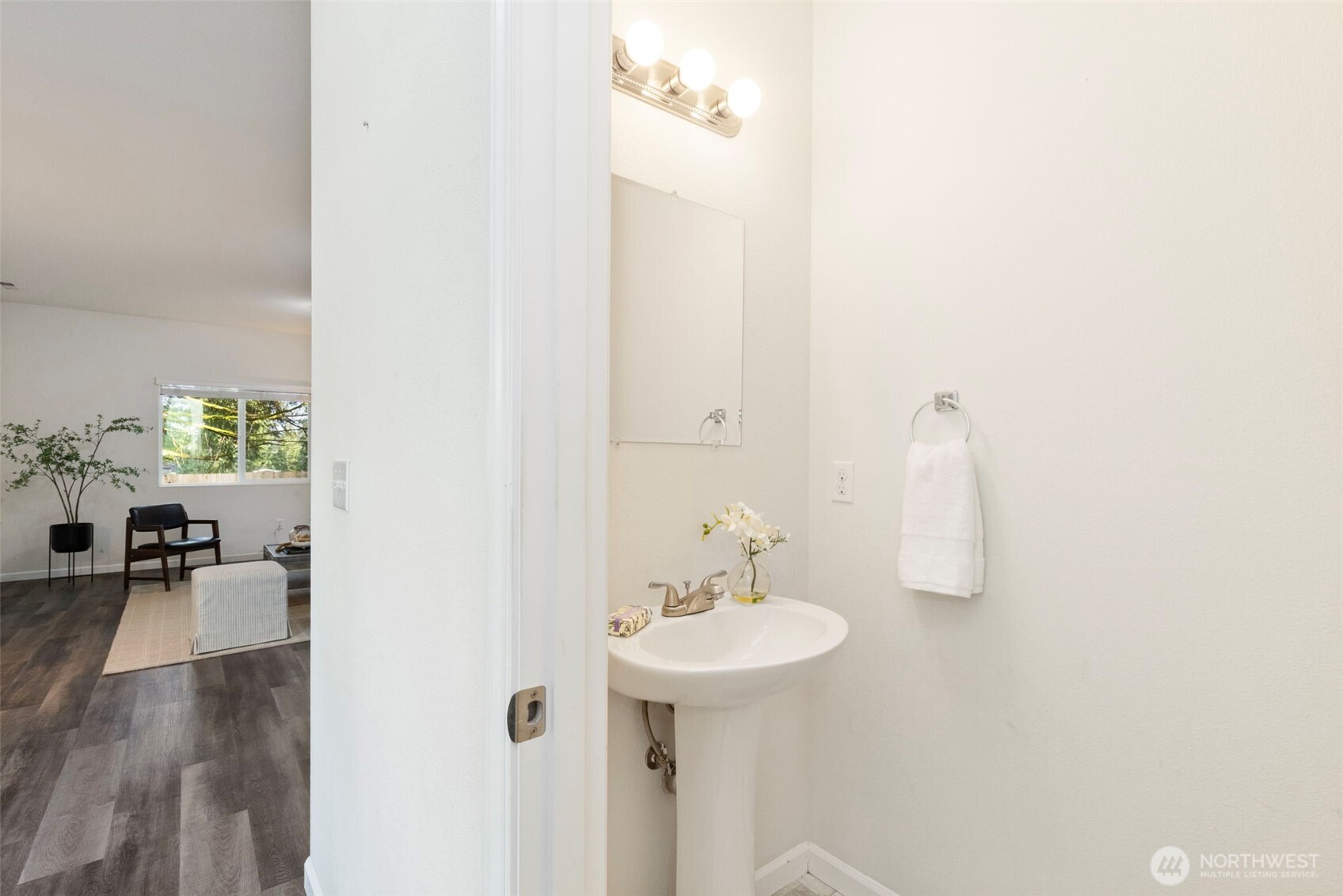 141 Southwest Marcia Way Port Orchard, WA 98366 - Photo 10 of 21 a bathroom with a sink and a mirror