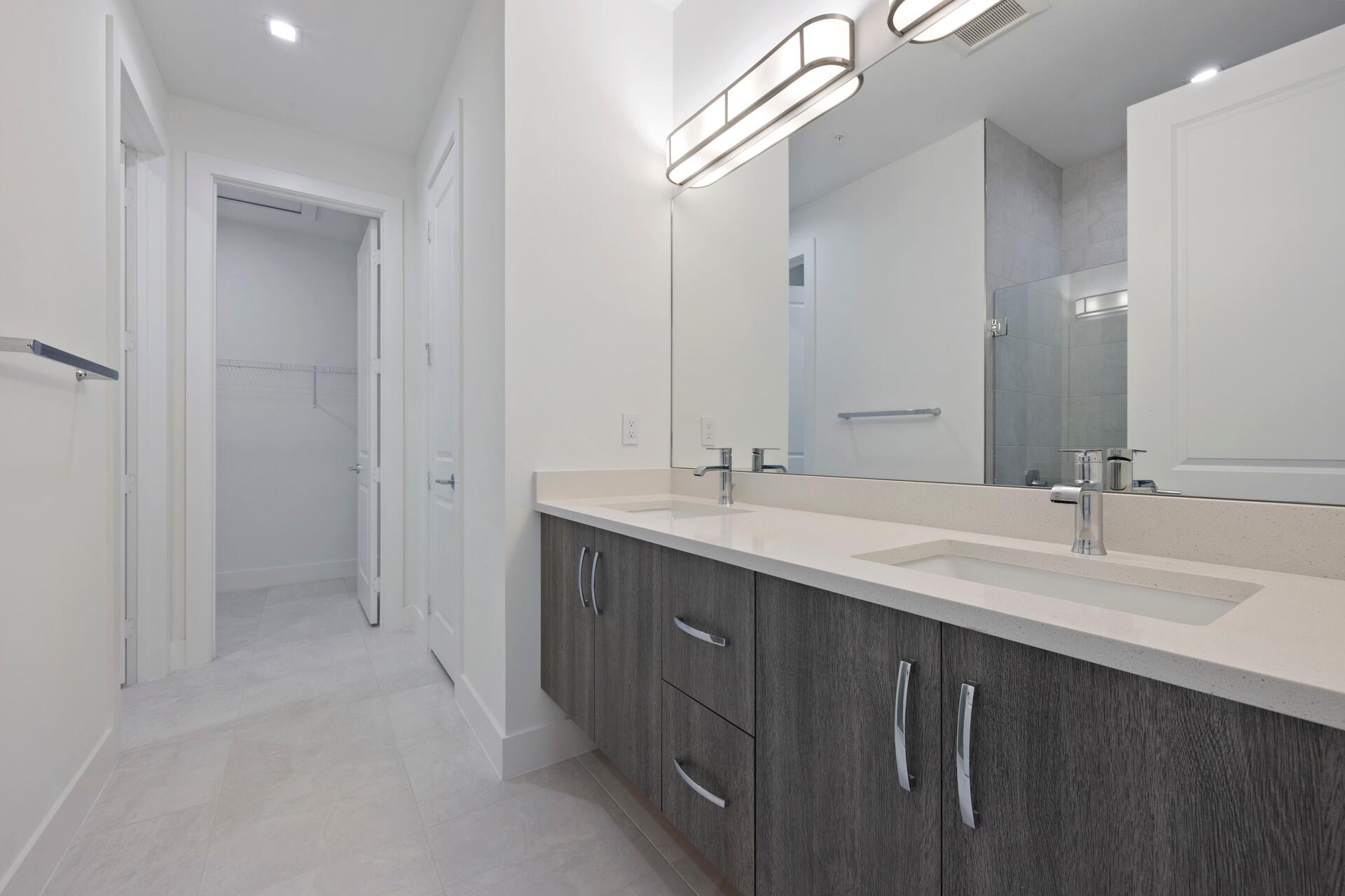 58 Atlantic Grove Way Delray Beach, FL 33444 - Photo 11 of 19 a bathroom with a double vanity sink mirror and