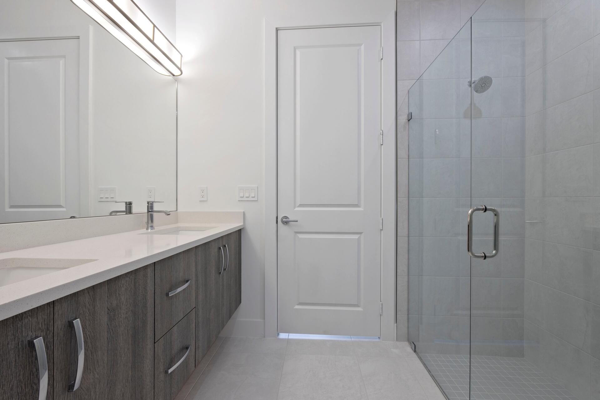 58 Atlantic Grove Way Delray Beach, FL 33444 - Photo 12 of 19 a bathroom with a double vanity sink and mirror