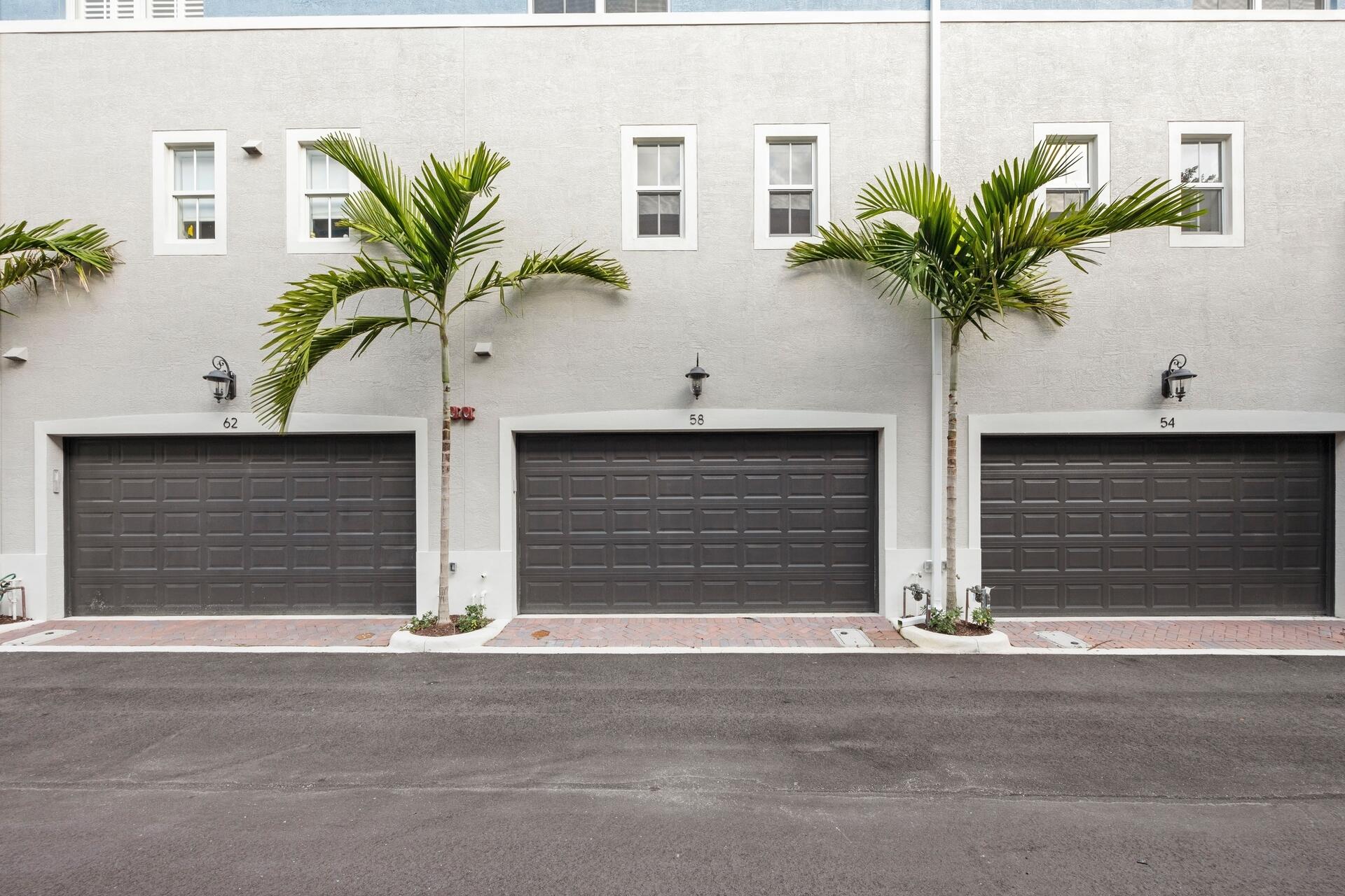 58 Atlantic Grove Way Delray Beach, FL 33444 - Photo 17 of 19 a plant in front of a house