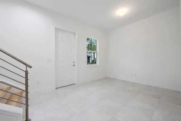 an empty room with windows