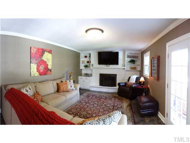 413 Kenwood Court Raleigh, NC 27609 - Photo 3 of 19 This room is the true embodiment of coziness & will be the gathering spot for all who enter your home. Den/Family/Great Room