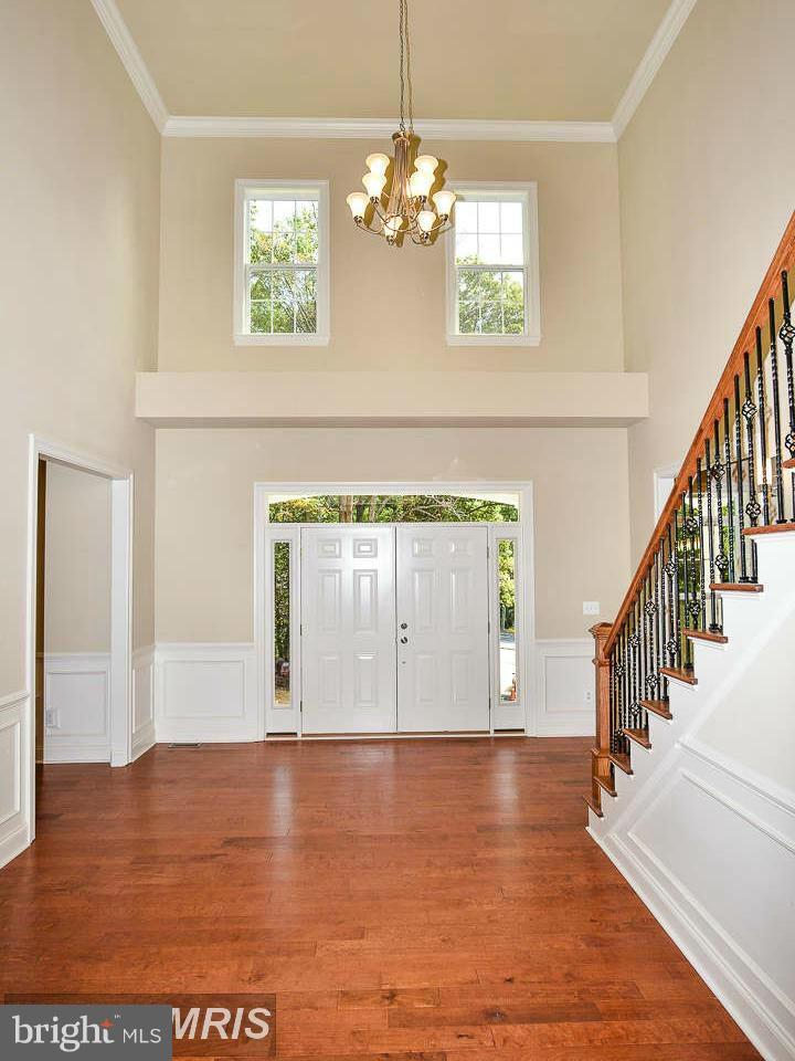 8536 Old Keene Mill Road Springfield, VA 22152 - Photo 10 of 30 a view of a room with wooden floor and windows