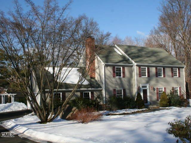 16 Standish Drive Ridgefield, CT 06877 - Photo 1 of 1 a front view of a house with a yard