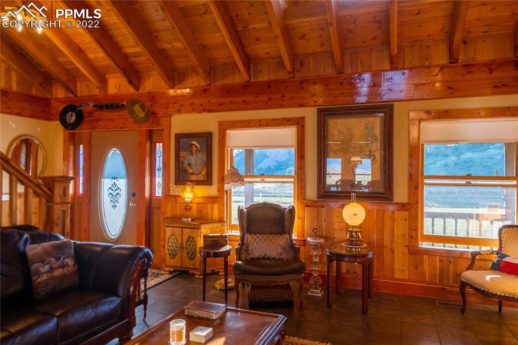 85 Excelsior Road Silver Cliff, CO 81252 - Photo 13 of 27 a work room with furniture