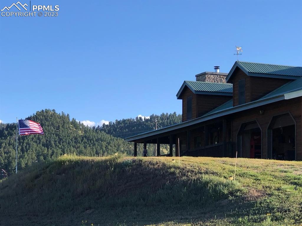 85 Excelsior Road Silver Cliff, CO 81252 - Photo 2 of 27 a house view with a outdoor space
