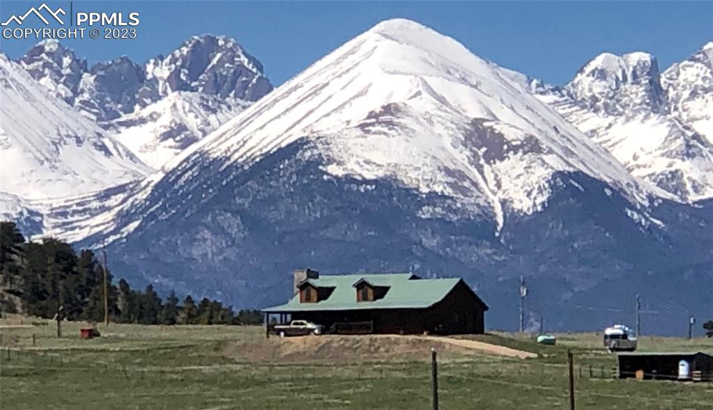 85 Excelsior Road Silver Cliff, CO 81252 - Photo 3 of 27 a view of swimming pool with a yard
